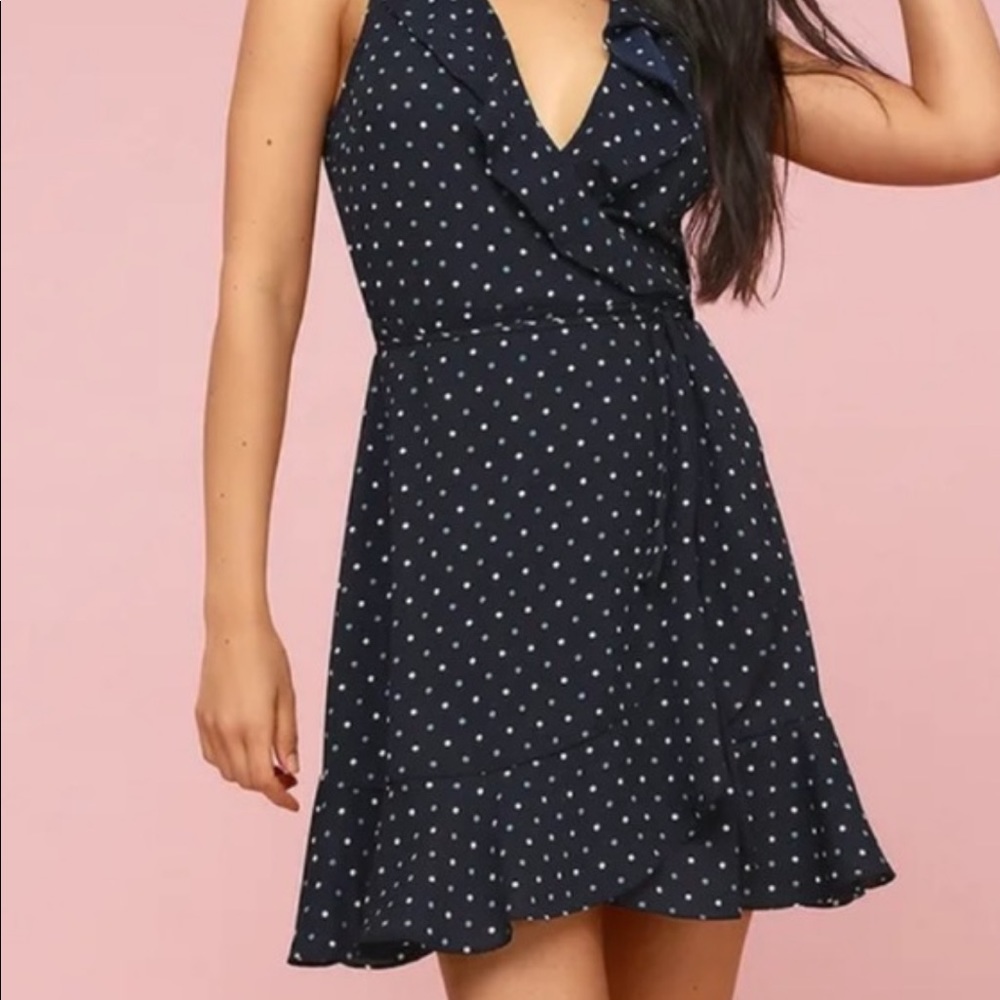 Lulu’s short, sleeveless polka-dot wrap dress. Such a cute dress!